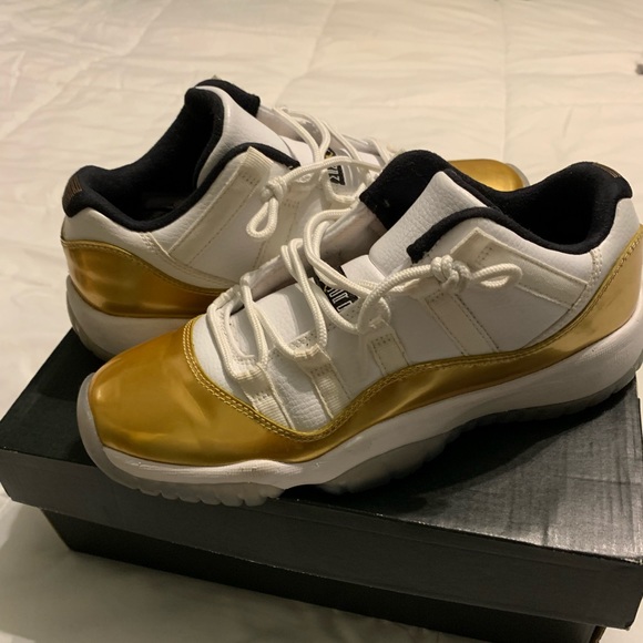Gold Jordan 11s size